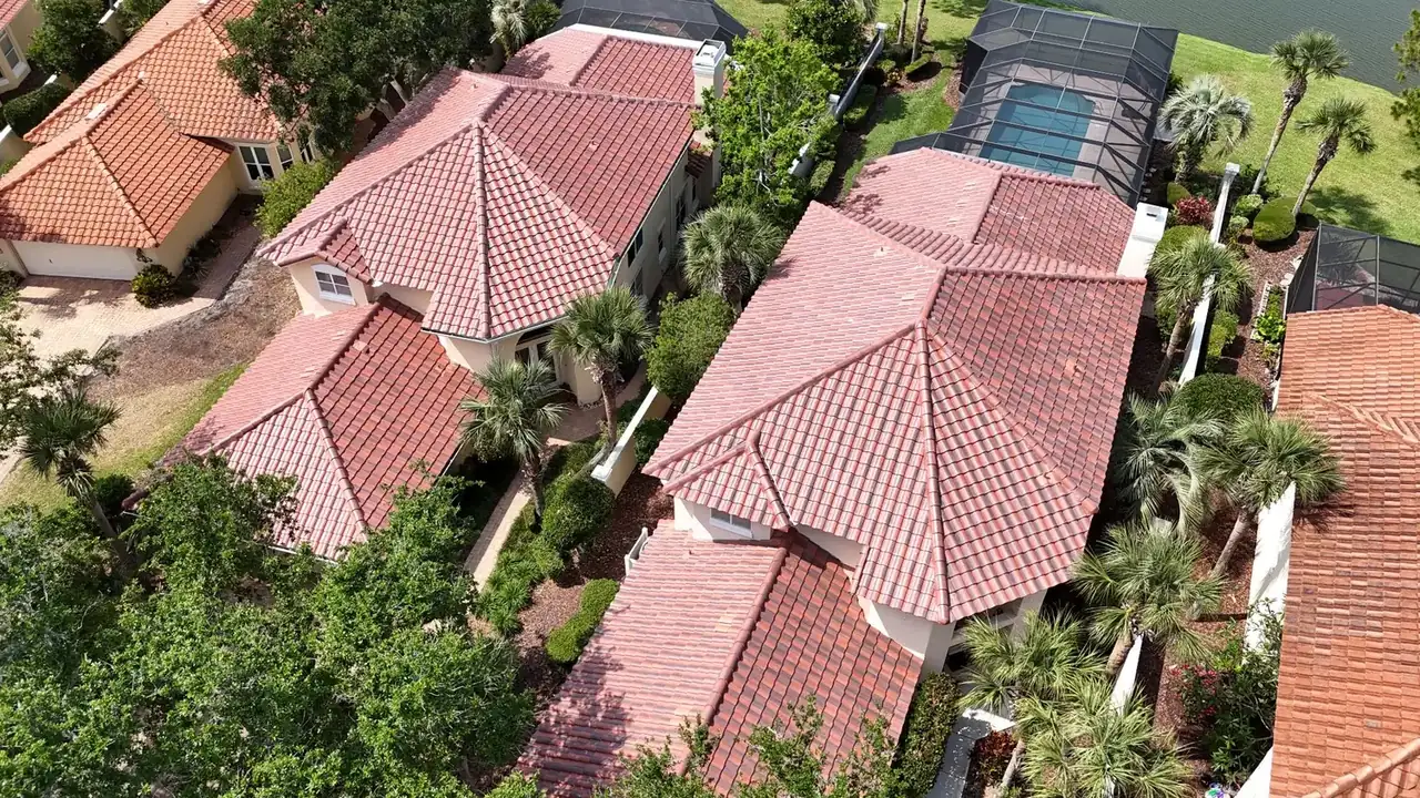 Aerial view of homes with new tile roofs